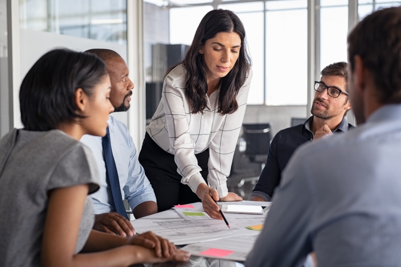 A group of people having a meeting