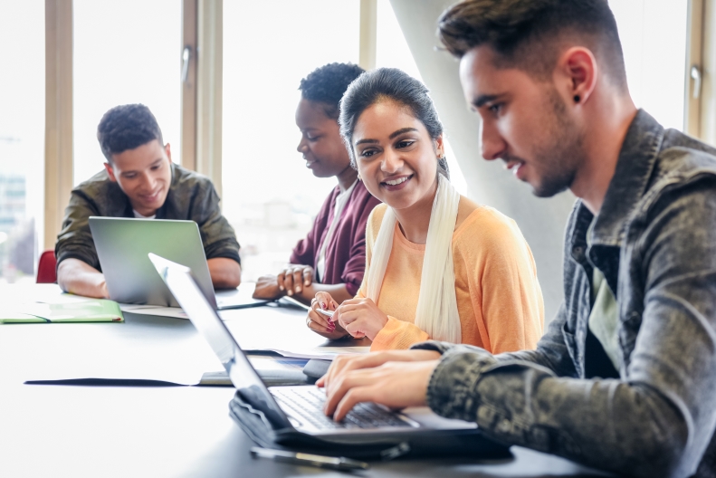 A group of people studying togeather